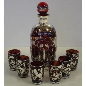 Silver overlay red glass liqueur set comprising of a decanter…