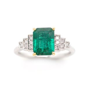 Emerald and diamond set 18ct white gold ring with yellow gold…