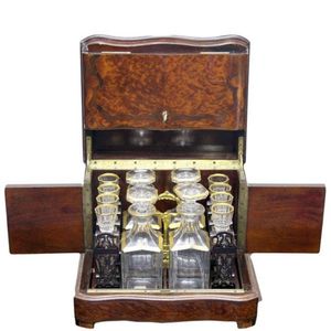 A Napoleon III French amboyna liqueur set: with hinged top…