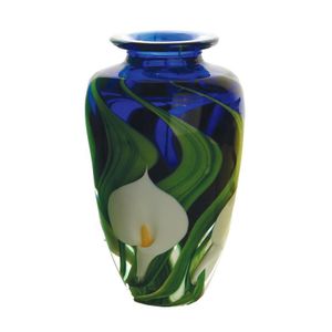 A Peter Raos lily vase, cala lilies and leaves on a blue ground.…