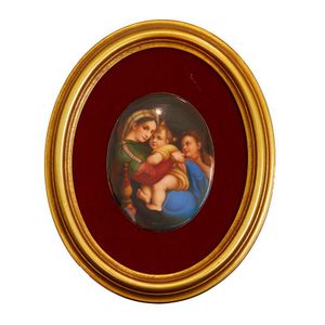 An oval painted Berlin plaque depicting Madonna and Child after…
