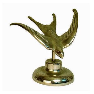 A chromed cast brass bluebird or swallow, c1930, possibly a car…