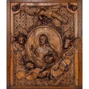 An impressive boiserie carved walnut panel of Salvador Mundi,…