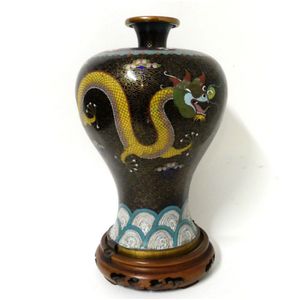 A cloisonne meiping vase, decorated with dragons on a black…