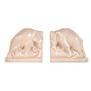 A pair of Art Deco Poole elephant book ends, with a pearlescent…