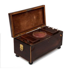 A George III satinwood inlaid mahogany tea caddy, with a…