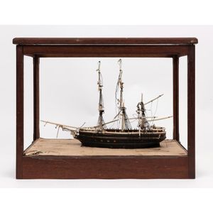 An antique sailing ship model in a display case, 19th century,…