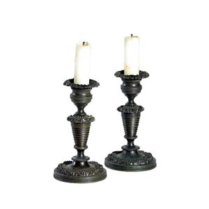 A pair of George IV bronze miniature candlesticks; each with a…
