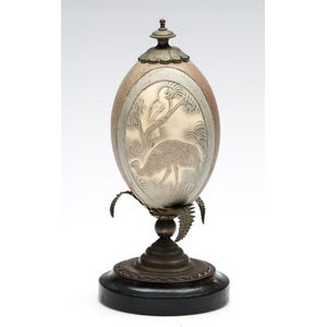 An Australian emu egg centre piece, height 22.5 cm carved to…