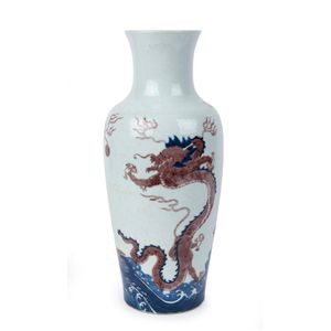 A Chinese blue and white porcelain dragon vase with copper red…