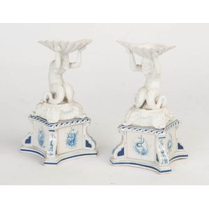 A pair of glazed and bisque porcelain sweet meat stands by&hellip;