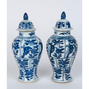 A pair of antique Chinese blue and white porcelain lidded vases,…