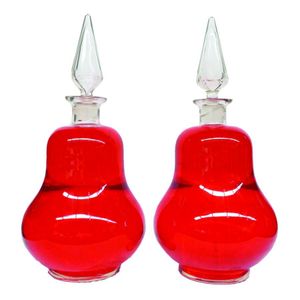 A pair of Victorian large clear glass pharmaceutical /…