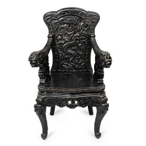 antique chair with dragon arms