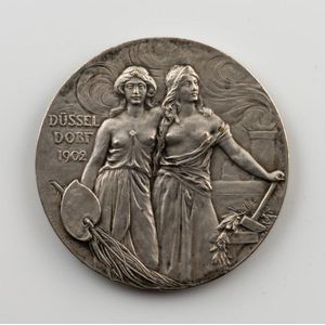 Three medals Exposition Internationale, Lyon, 1914, a gilt…