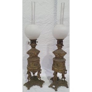 A good pair of French heavily embossed gilt bronze Carcel lamps.…