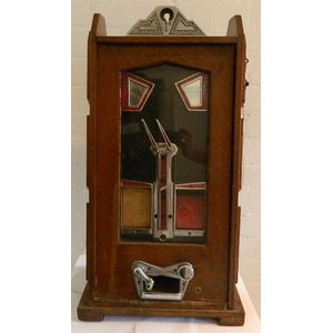 An early 20th century oak Penny slot arcade machine, height 75…