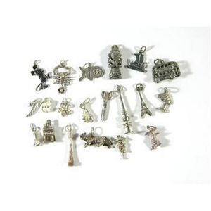 A collection of sterling silver Charms including Mickey Mouse,…