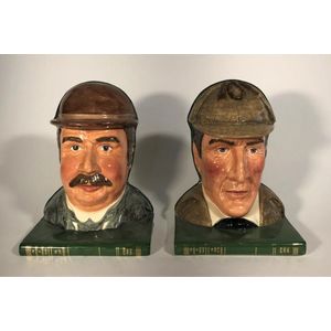 A pair of Royal Doulton Sherlock Holmes D7038 & Dr Watson book…