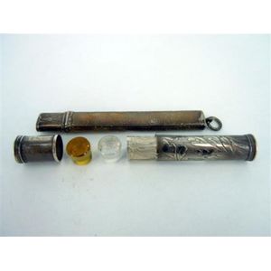 A silver seal case and a needle case, cylindrical seal case…