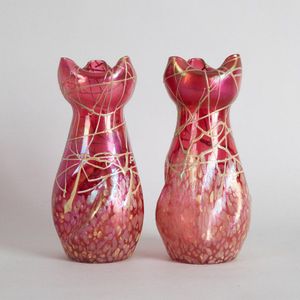 A pair of Loetz Art Nouveau glass vases, each with a gold…