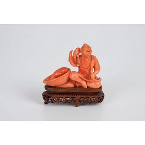 Carved pink coral figure of seated fisherman with catch, 6.5 cm&hellip;