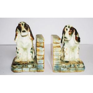 Pair spaniel form ceramic bookends each of a seated spaniel,…