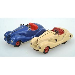 Two Schuco (Germany) key wind car models, including Akustico…