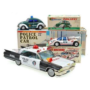 Three Japanese tinplate models, including Daishin 'Polizei' car;…