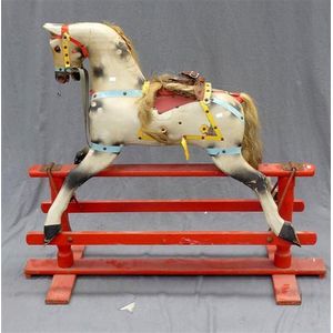 An Australian made rocking horse, 104 cm high. 110 cm long, 40…