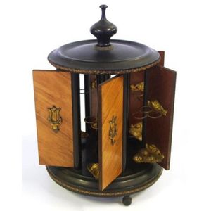 Vintage timber revolving cigar dispenser decorated in metal…