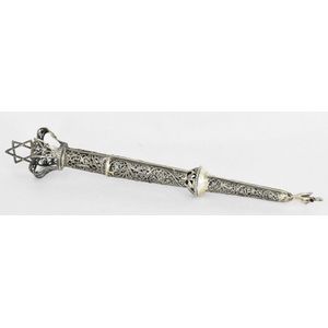 A silver torah yad, all made of filigree work, with the…