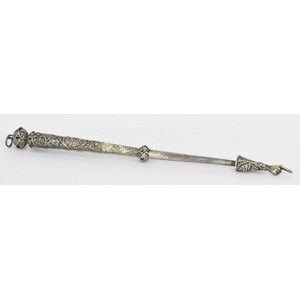 A Russian-Polish silver torah yad, with filigree design. By A.A,…