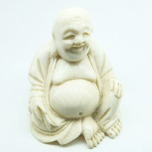 Carved ivory Oriental Buddha - price guide and values