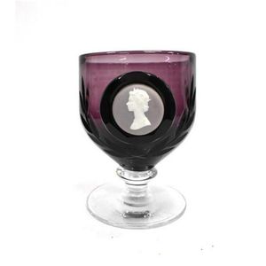 A Wedgwood Silver Jubilee amethyst glass with Queen Elizabeth…