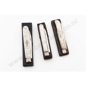 Three Georgian sterling silver and mother of pearl pocket…