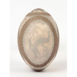 An antique carved emu egg with three vignettes titled…