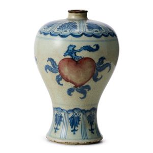 A Chinese blue and white and copper-red 'Sanduo' vase,…