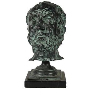 Bronze patinated bust of Bearded man set upon a marble base,…