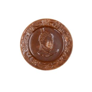 Crown Lynn Wharetana Ware, 'Maori Chief' wall plate, brown&hellip;