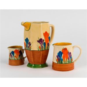 Three Clarice Cliff jugs in the Bizarre Crocus pattern, circa…