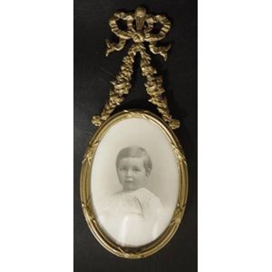 Vintage decorated brass photo frame decorted with garlanded…