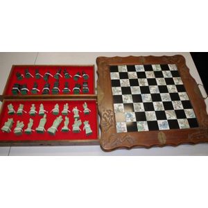 Chinese carved wood chess board & pieces wood case, opening to…