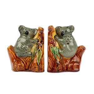 A pair of Australian pottery koala bookends modelled as two…