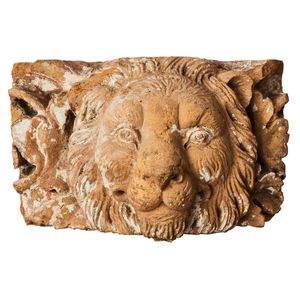 A composite stone architectural element modelled as a lion mask,…