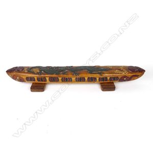 A Jane Brenkley carved wood 'wakahuia', of elongated form…