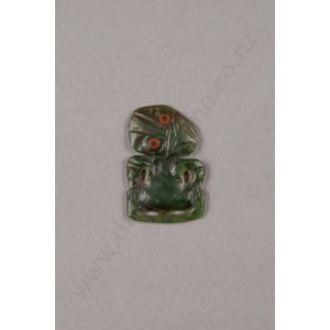 Small pounamu hei tiki, type I form carved in Bowenite variety…