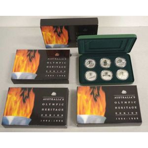 Four 1996 $10 UNC silver coin sets 'Australian Olympic Heritage…