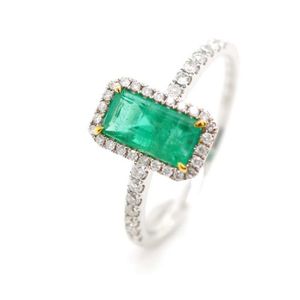 Emerald and diamond set 18ct white gold ring marked 750. Approx…