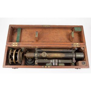 Cased brass Throughton & Simms level, complete with tripod